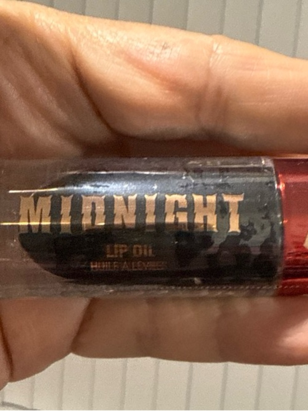 Revolution Midnight Lip Oil — Black Shimmer